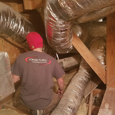 fort worth duct cleaning tech in attic