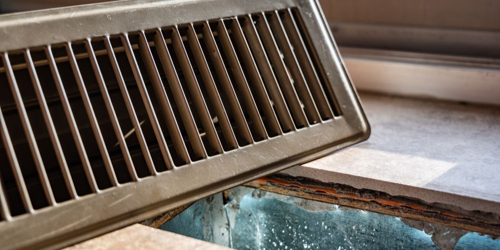 an open air vent cover on the floor
